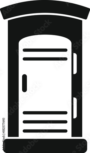 Black silhouette of a public portable toilet cabin standing outside