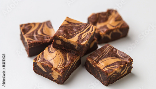 decadent peanut butter brownies, featuring a rich, fudgy chocolate base swirled with creamy peanut butter, set against a clean white background photo