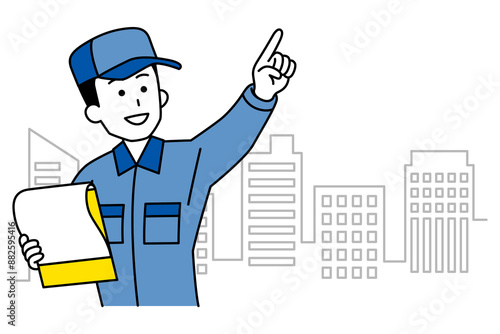 都市部で図面を見ながら遠くを指差すつなぎ作業服の男性