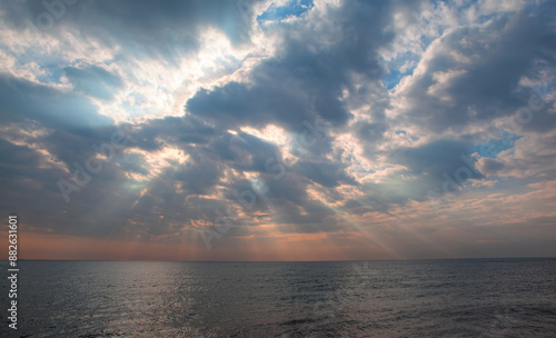 The background of sun rays in the clouds