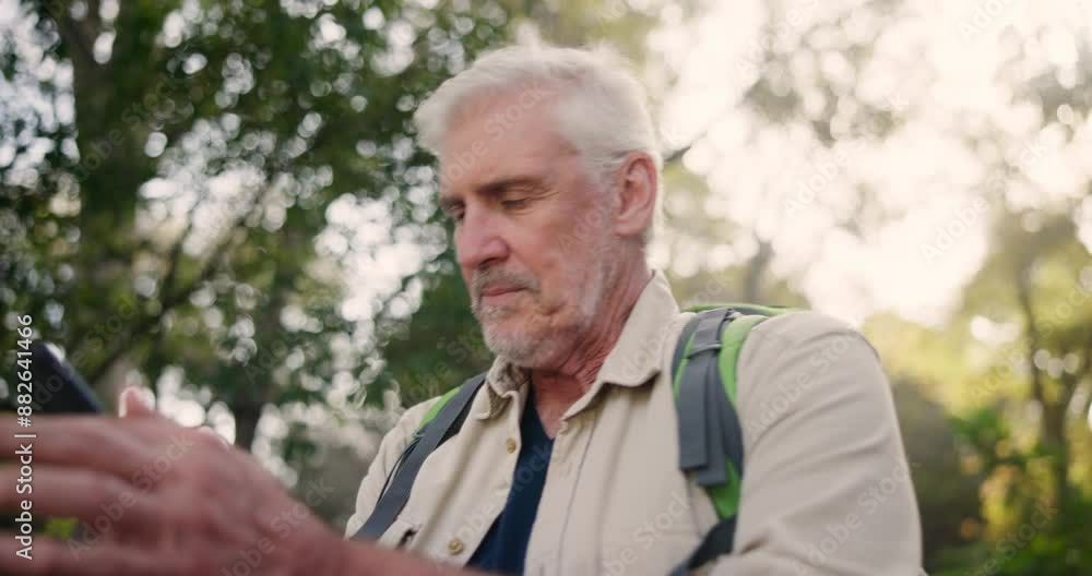 Man, hiking and phone with lost signal in outdoor for connect, trekking and backpacking in forest with reception error. Angry, mature person and travel for poor location, adventure or survivor Man, hiking and phone with lost signal in outdoor for connect, trekking and backpacking in forest with reception error. Angry, mature person and travel for poor location, adventure or survivor
