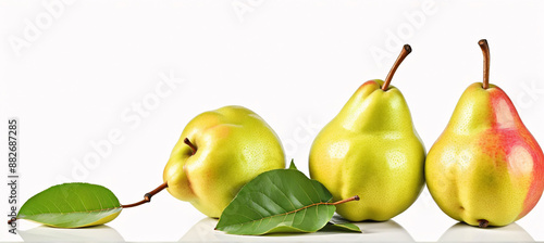 A lush arrangement of ripe pears paired with vibrant green leaves in a rustic display
