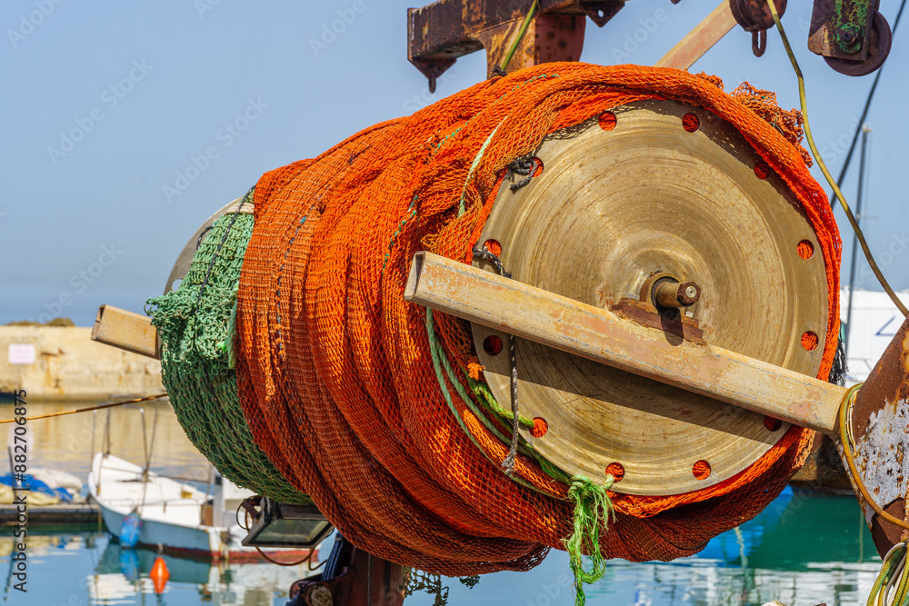 Fishing net and boats, historic port of Jaffa