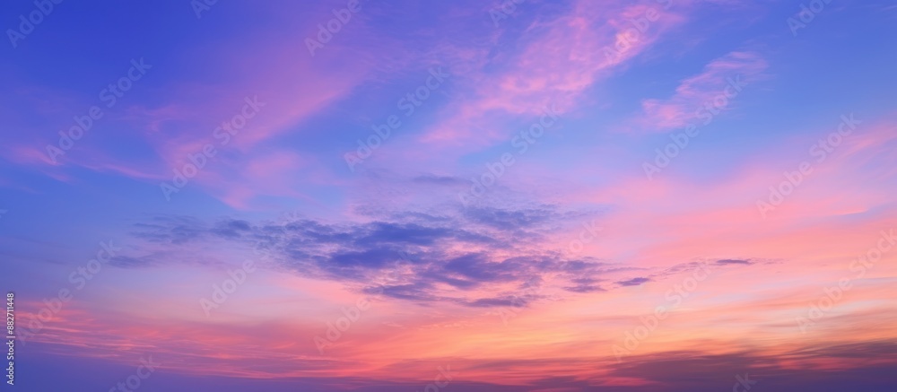 Fototapeta premium Pink and Blue Sunset Sky with Clouds