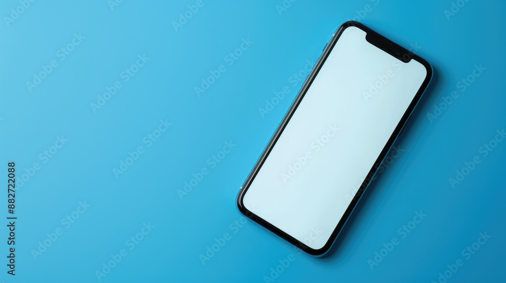 Smartphone with blank screen on blue background for business and technology concept Smartphone with blank screen on blue background for business and technology concept