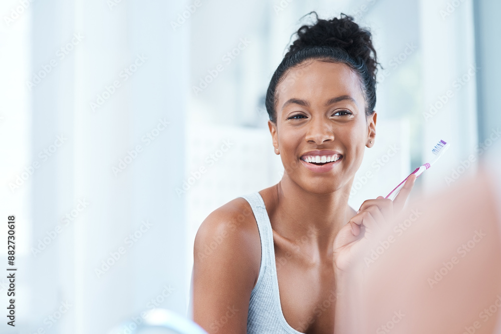 Brushing teeth, reflection and smile of woman in bathroom of home with toothbrush for dental care. Cleaning, mirror and teeth whitening with happy person in apartment for morning dentistry routine