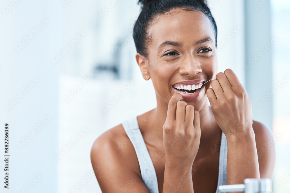 Dental care, bathroom and woman floss teeth for health, wellness and morning routine. Oral hygiene, plaque removal and female person with clean mouth treatment for fresh breath by mirror at home. Dental care, bathroom and woman floss teeth for health, wellness and morning routine. Oral hygiene, plaque removal and female person with clean mouth treatment for fresh breath by mirror at home.