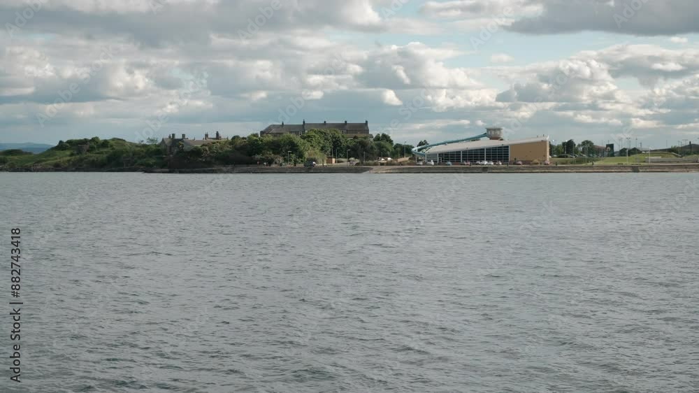 BURNTISLAND, FIFE, SCOTLAND, UK - JUNE 11, 2024: A summer day in Burntisland, view on Leisure Center, Fife, Scotland. BURNTISLAND, FIFE, SCOTLAND, UK - JUNE 11, 2024: A summer day in Burntisland, view on Leisure Center, Fife, Scotland.