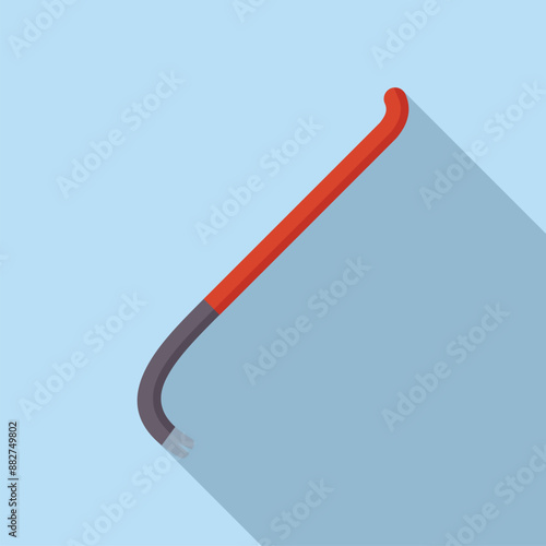 Red crowbar lying on a blue background, casting a long shadow