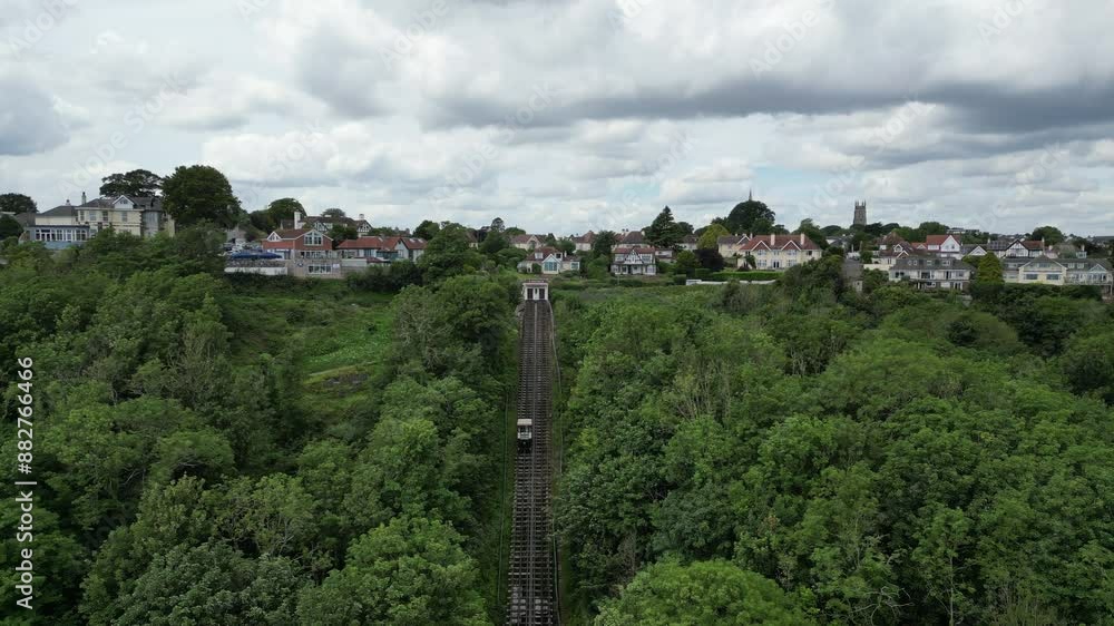 Babbacombe, South Devon, England: DRONE VIEWS: Babbacombe Cliff Railway and its funicular trains. Babbacombe is a popular English tourist destination (Clip 3). Babbacombe, South Devon, England: DRONE VIEWS: Babbacombe Cliff Railway and its funicular trains. Babbacombe is a popular English tourist destination (Clip 3).