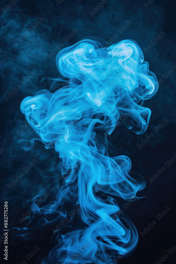 Hypnotic blue smoke swirling against a dark background, creating a mesmerizing and captivating abstract visual effect. Hypnotic blue smoke swirling against a dark background, creating a mesmerizing and captivating abstract visual effect.