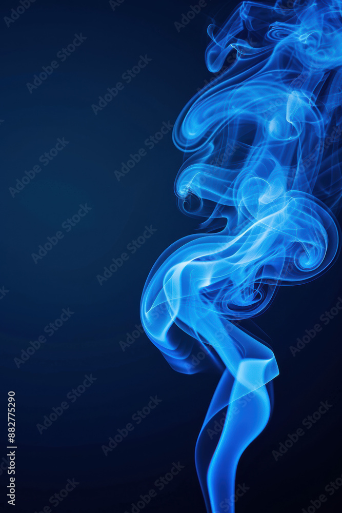A mesmerizing swirl of blue smoke set against a deep, dark background, creating an abstract and mysterious visual effect. A mesmerizing swirl of blue smoke set against a deep, dark background, creating an abstract and mysterious visual effect.