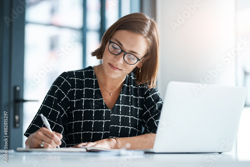 Office, woman and laptop or writing in notebook for proposal, application and requirement to stakeholder. Grant writer, closeup and research funding for non profit organization, submission and review