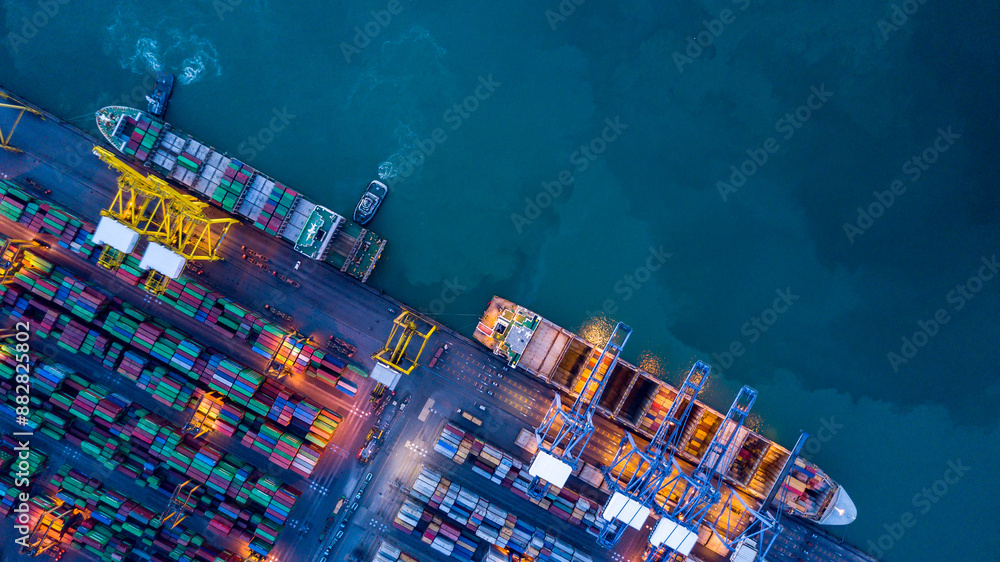 Aerial view container cargo ship at commercial sea port, Global business logistic import export transportation international by container cargo ship, Container cargo ship freight shipping at night.