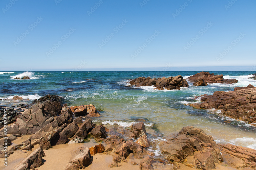 rocks and crashing waves on the beach rocks and crashing waves on the beach
