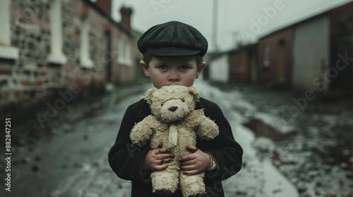 A child in gloomy Edwardian attire, clutching a worn teddy bear, standing in a desolate, rainsoaked alley, realistic, cool tones, highly detailed, somber scene photo