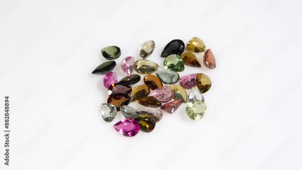 natural multi color ourmaline gem on the background natural multi color ourmaline gem on the background