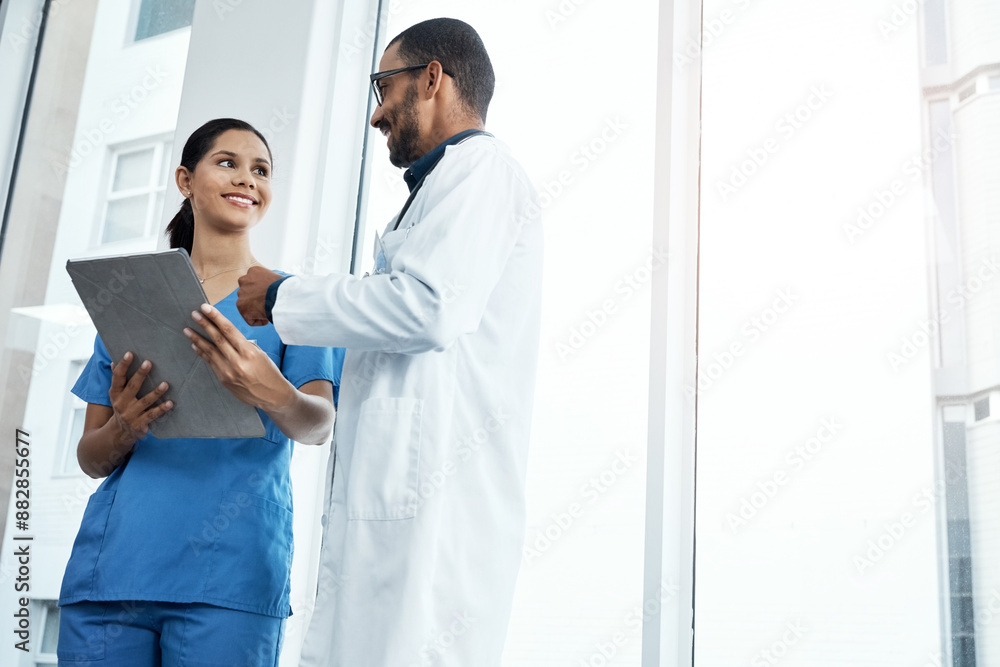 Medical, smile or tablet with man and woman in hospital together for collaboration, diagnosis or discussion. Consulting, healthcare or review with doctor and nurse in clinic for feedback or research Medical, smile or tablet with man and woman in hospital together for collaboration, diagnosis or discussion. Consulting, healthcare or review with doctor and nurse in clinic for feedback or research