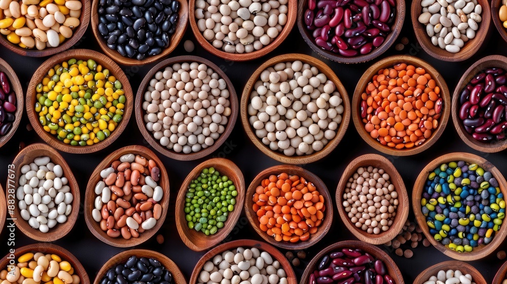 Various dried beans and lentils in wooden bowls on a black background SEAMLESS PATTERN Various dried beans and lentils in wooden bowls on a black background SEAMLESS PATTERN