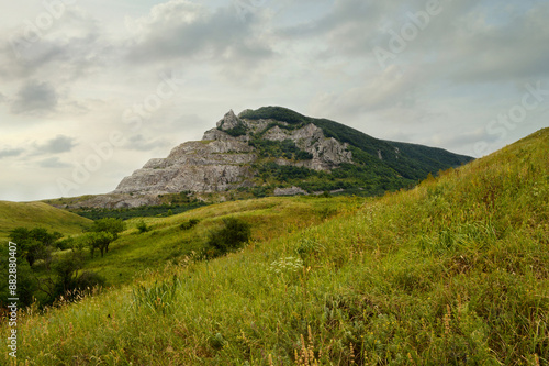 Mountain Zmeyka near Mineralnye Vody town, North Caucasus, Russia. Panoramic view of Zmeyka mountain, part of which was disfigured during mining explosions.