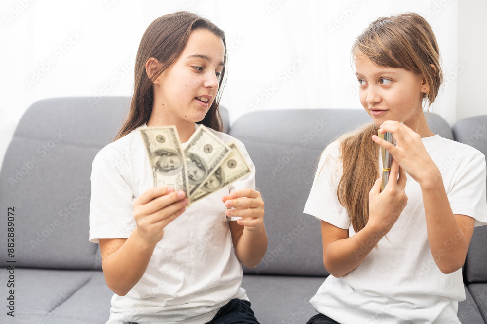 Portrait of two business children with US Dollars as symbol of bribe in an envelope. Portrait of two business children with US Dollars as symbol of bribe in an envelope.