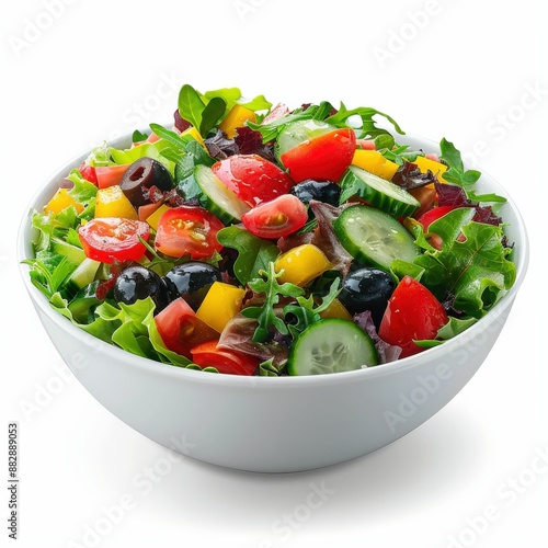 Fresh and Colorful Vegetable Salad in a White Bowl with Tomatoes, Cucumbers, Peppers, and Olives