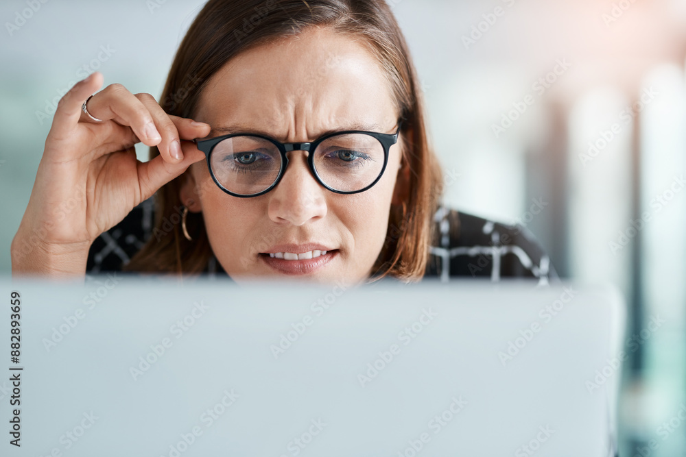 Girl, online and confused in office for reading miscommunication, unclear instructions and new software. Woman, glasses and closeup with laptop or uncertain for information overload and research. Girl, online and confused in office for reading miscommunication, unclear instructions and new software. Woman, glasses and closeup with laptop or uncertain for information overload and research.