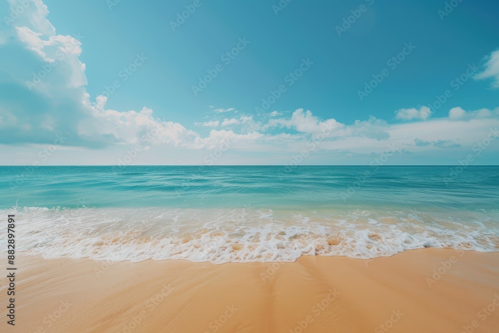 Gentle Waves Lapping at the Sandy Shore on a Bright Sunny Day Gentle Waves Lapping at the Sandy Shore on a Bright Sunny Day