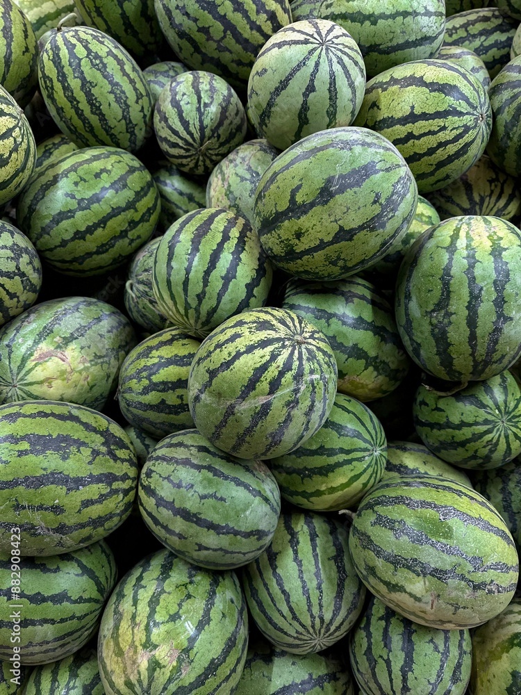 Lots of fresh organic watermelons at the farmer's market, top view. Lots of fresh organic watermelons at the farmer's market, top view.
