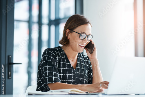 Happy, woman and phone call in office with laptop for work as receptionist, administrative support and multitasking skill. Female employee, online and conversation to confirm appointment and planning photo