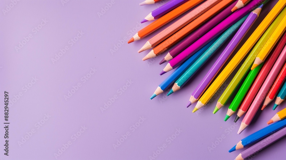 Creative Artistic Design with Colorful Crayons and School Supplies on Lilac Background Creative Artistic Design with Colorful Crayons and School Supplies on Lilac Background