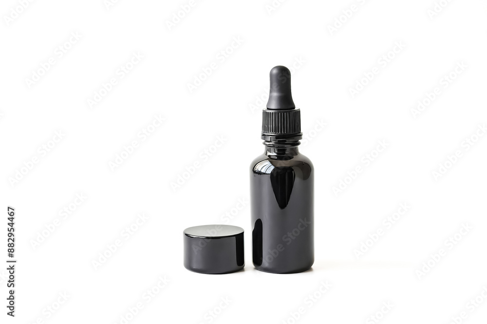 Black Glass Dropper Bottle with Lid on White Background Black Glass Dropper Bottle with Lid on White Background