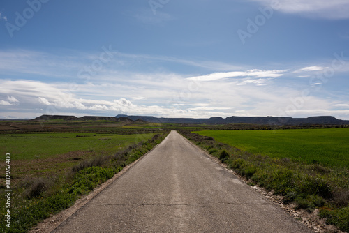 Dirt and sand road on a sunny, blue sky day. Stage and beginning of the path and new beginnings