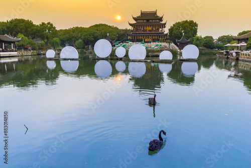Obraz na płótnie Swans in the lake at the pavillion in Panmen scenic area in Suzhou, China w salonie