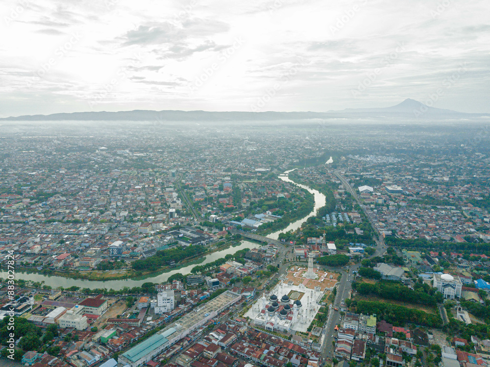 Aerial drone view of big city skyline scenery in Banda Aceh, Aceh, Indonesia. Aerial drone view of big city skyline scenery in Banda Aceh, Aceh, Indonesia.