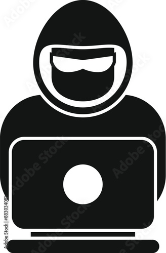 Hacker using laptop wearing sunglasses and balaclava committing cyber crime