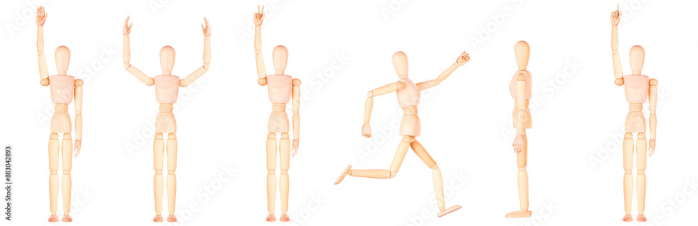 Assortment of wooden mannequins in different stances, isolated on white backdrop Assortment of wooden mannequins in different stances, isolated on white backdrop