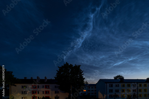 the silvery clouds above Valka's city houses photo