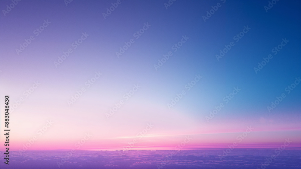 Fototapeta premium Vibrant beautiful sunset sky with clouds in purple and pink hues.