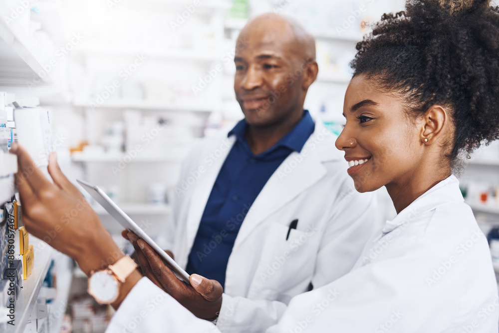 Fototapeta premium Healthcare, tablet and pharmacist as black people in clinic of medicine stock, reading and check for label information. Woman, man and digital Telehealth for medical inventory, inspection and retail