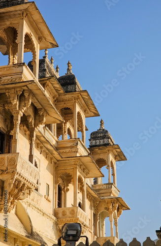 A picture of a building in Udaipur palace which shows the beautiful architecture high is unique to Rajasthan