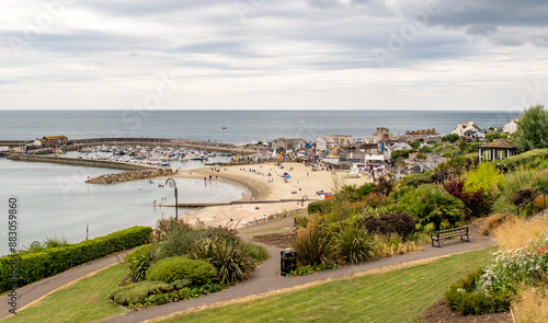 View over Langmoore and Lister Gardens and ocean in the seaside town of Lyme Regis, Dorset photo