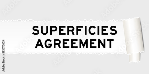 Ripped gray paper background that have word superficies agreement under torn part