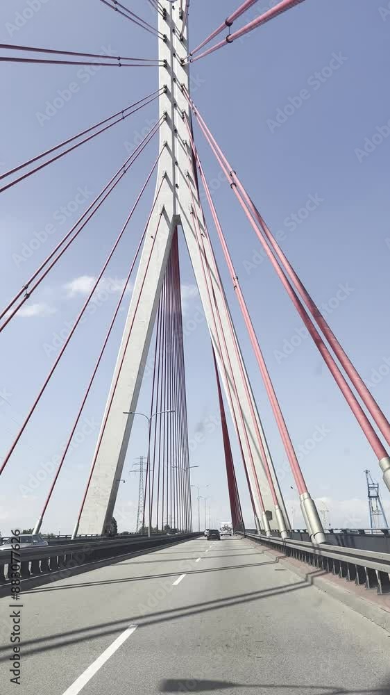 Recording of movement across a beautiful bridge from inside a car. Recording of movement across a beautiful bridge from inside a car.