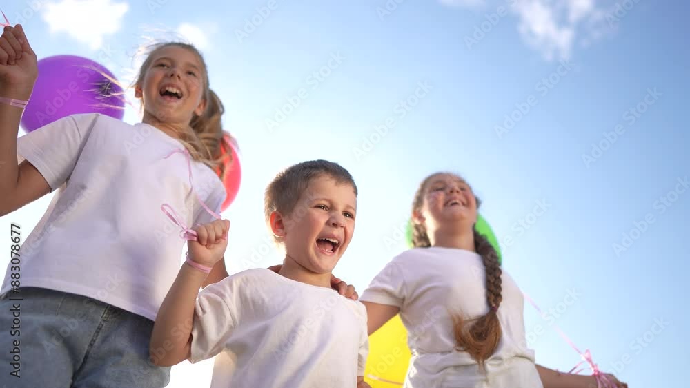 Family. Children celebrating together with balloons. Happy family holiday dream concept. Children jumping balloons holiday. Children jumping together with balloons festive lifestyle. Family. Children celebrating together with balloons. Happy family holiday dream concept. Children jumping balloons holiday. Children jumping together with balloons festive lifestyle.