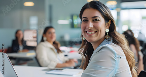 Happy woman  portrait and laptop with team for company research  about us or collaboration at office. Female person or employee with smile on computer for business growth or project at workplace