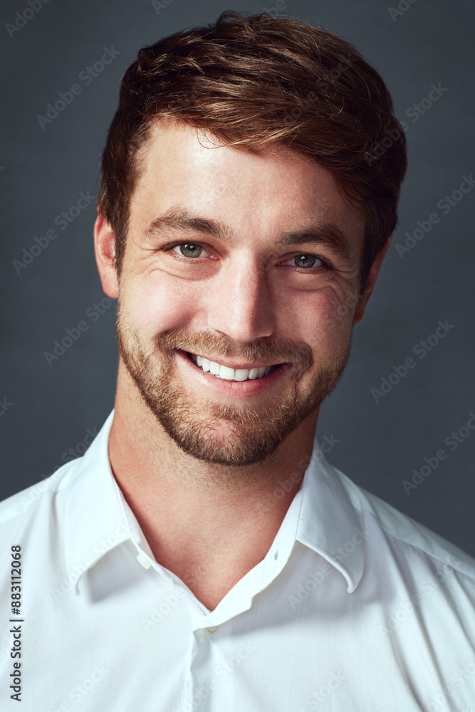 Obraz premium Portrait, smile and man with shirt, studio and proud with internship in bank for bookkeeper and employee. Grey background, professional and clothes for accountant, cheerful and confidence of person