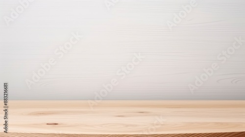 Empty wooden table and white wall background.