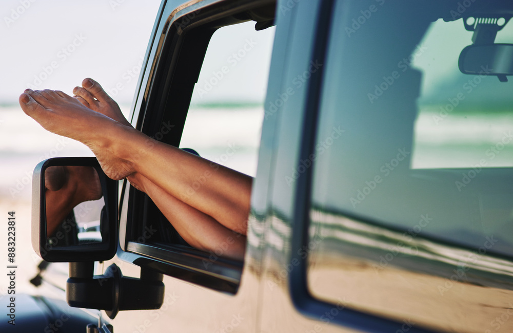 Naklejka premium Relax, car and woman feet in window for road trip, travel adventure and summer vacation by beach. Female person, barefoot and legs out of motor for holiday drive, peace and stop by ocean for rest
