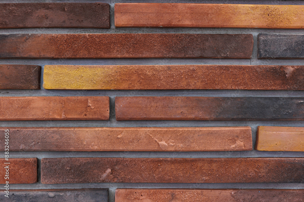 Background with a wide texture of decorative brick wall. Background for home or office design. Background with a wide texture of decorative brick wall. Background for home or office design.